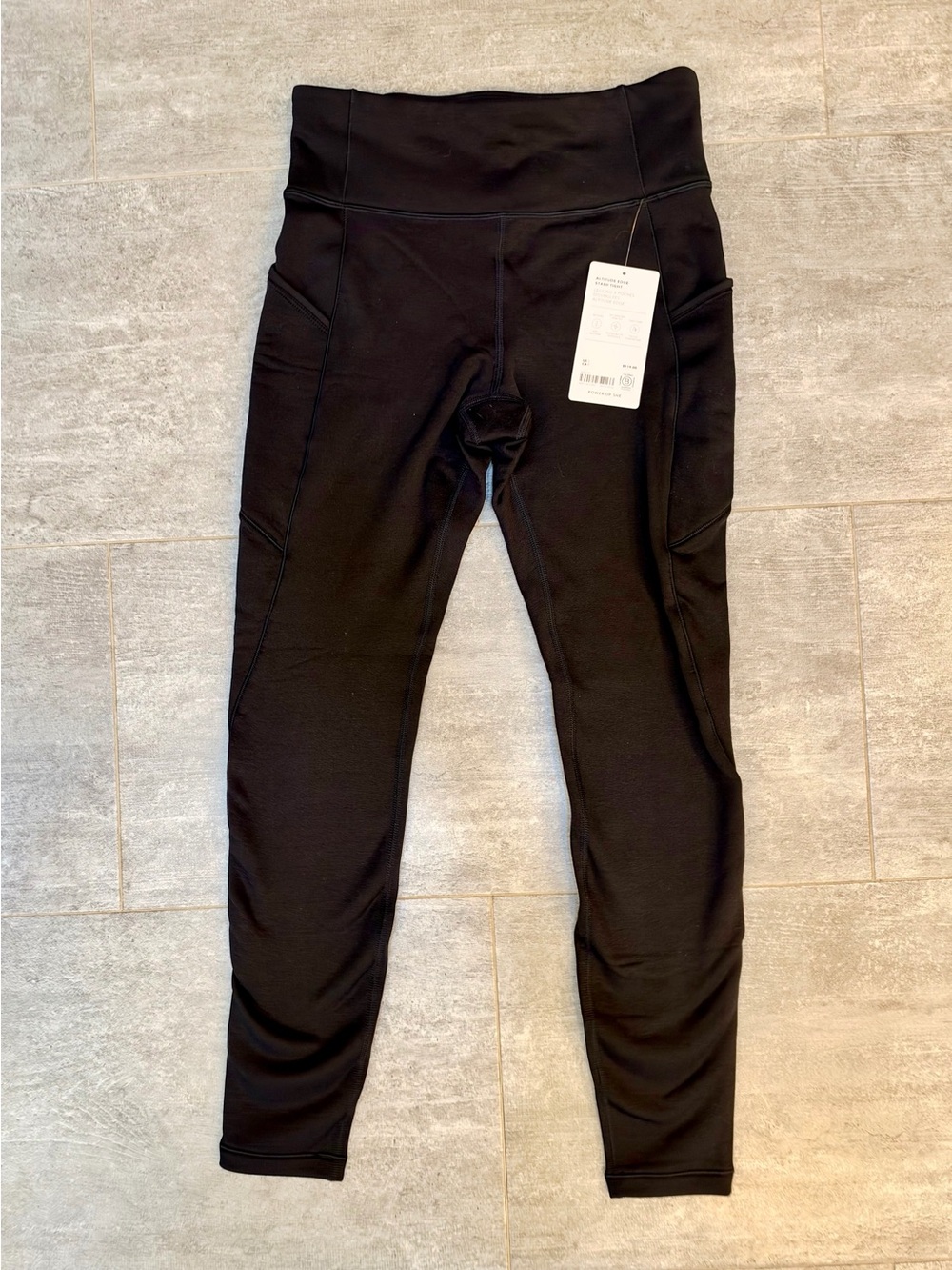 Athleta - women’s altitude black fleece leggings with Side Pockets NWT
